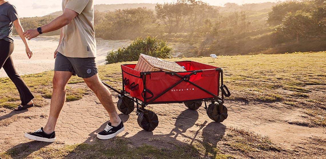 Wanderer Camp Cart on the shore with tent