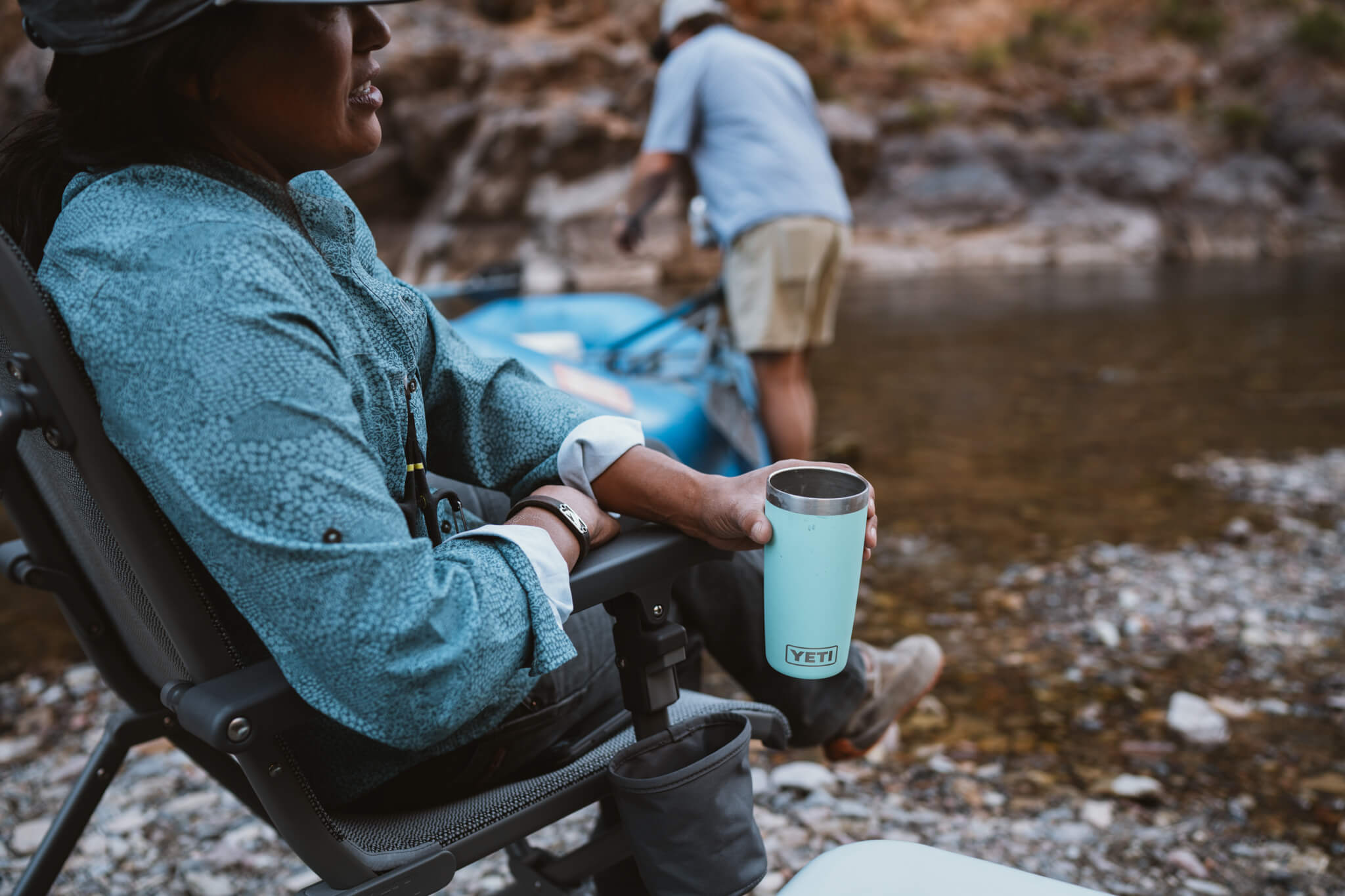 Mum holding a Macpac tumbler