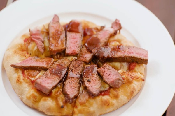 Steak cheese and onion pizza on Ozpig