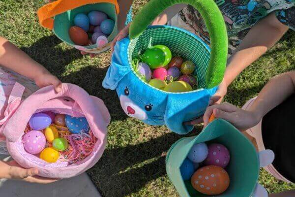 Kids searching for Easter eggs around the campsite