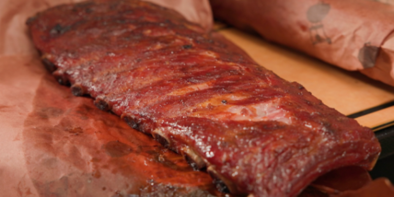Ribs coated with BBQ rub Ribs coated with BBQ rub