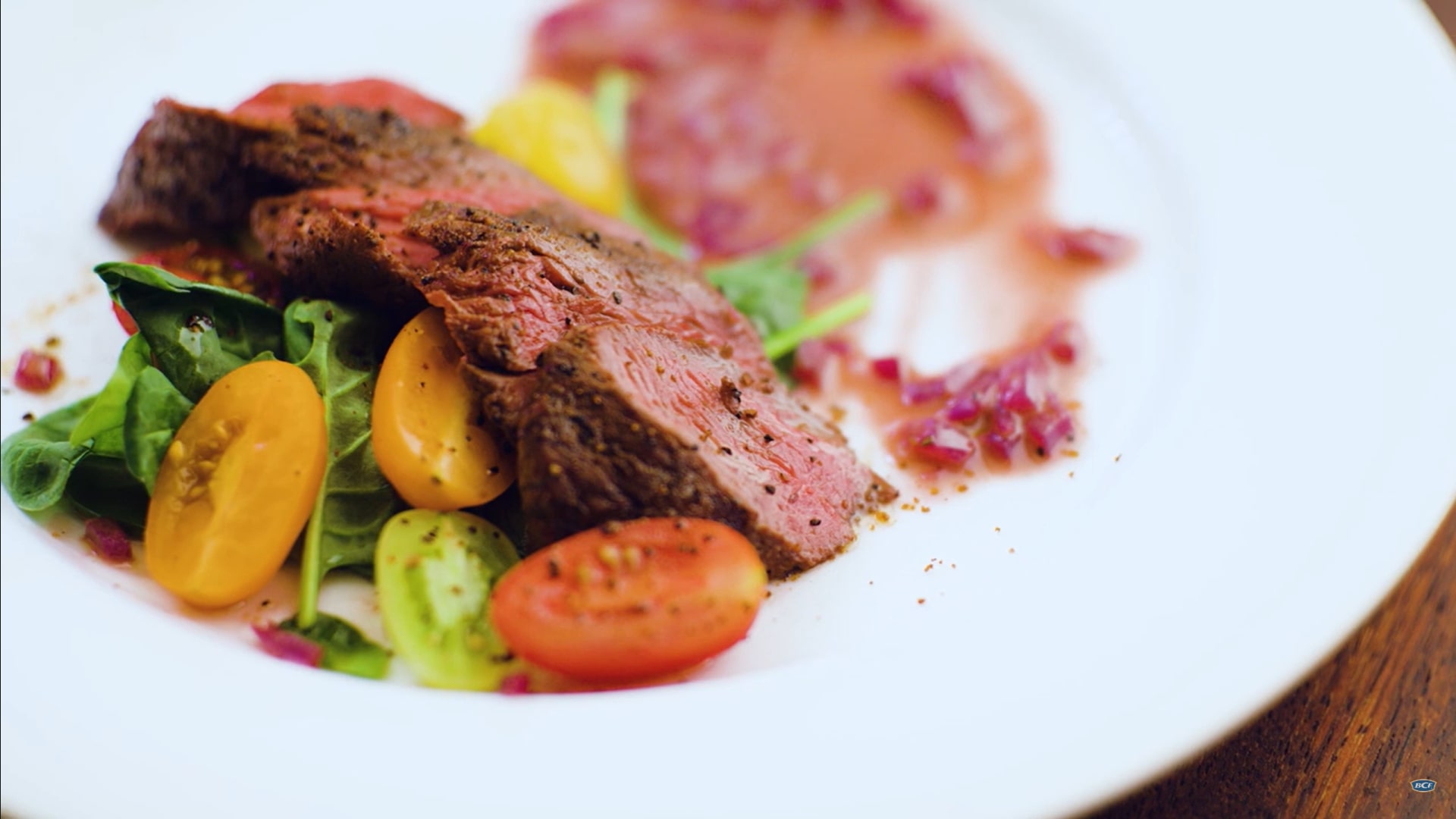 Finished kangaroo steak dish with red wine sauce