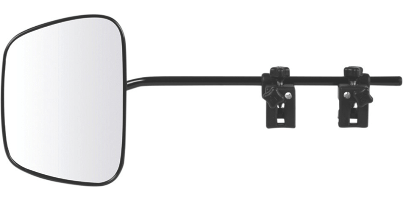 Driver adjusting towing mirrors on a 4WD before towing a caravan